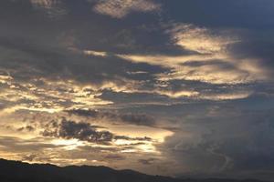 beauty of the orange sky. Colorful cloudy sky at sunset. Sky texture, abstract nature background photo