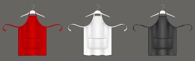 Chef aprons, black, red, white uniform on hangers vector