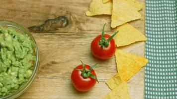 Guacamole salad with nachos and Mexican flag video