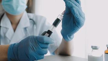 Medical Research Laboratory Portrait of a Female Scientist Wearing Face Mask Using Micro Pipette for Analysis. Advanced Scientific Lab for Medicine, Biotechnology Development.  Shot video