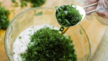 Macro filming of Worcestershire sauce. The chef pours the sauce into a spoon video