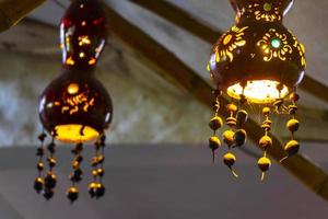 Beautiful decorative homemade lamps lights on Holbox island Mexico. photo