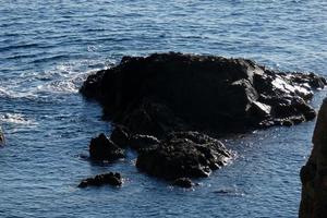 Rocks and sea in the catalan costa brava, mediterranean sea, blue sea photo