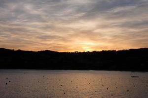 sunset or sunrise, contrasts and lights in the horizon, contrasts photo