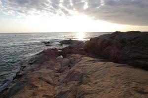 Mediterranean coastline with rocks in the catalan region, Spain photo