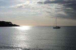 Sailboat sailing in the mediterranean sea, calm waters photo