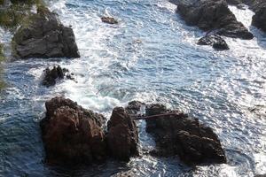 Rocks and sea in the catalan costa brava, mediterranean sea, blue sea photo