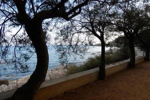 Costa brava and coastal path along the rugged coastline of northern catalonia, Spain photo