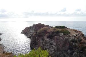 Costa brava and coastal path along the rugged coastline of northern catalonia, Spain photo