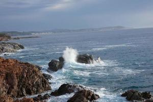 Rocks and sea in the catalan costa brava, mediterranean sea, blue sea photo