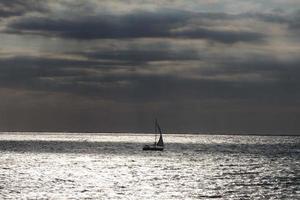 Sailboat sailing in the mediterranean sea, calm waters photo