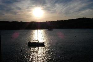 Sailboat sailing in the mediterranean sea, calm waters photo