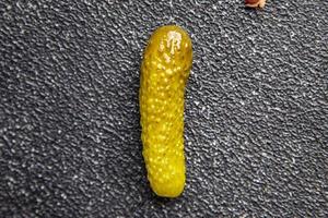 gherkin cucumbers pickled cucumber vegetable meal food snack on the table copy space food background photo