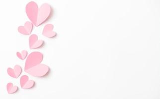 Shape of heart flying on white paper background. photo