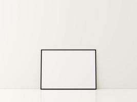 Frame with poster mockup standing on the white floor. minimalist frame mockup. 3d rendering photo