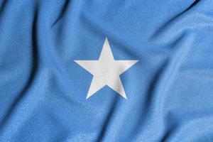bandera nacional de somalia. el principal símbolo de un país independiente. bandera de somalia. un atributo del gran tamaño de un estado democrático. foto