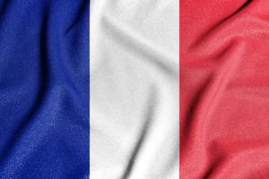 National flag of the France. The main symbol of an independent country. Flag of France. An attribute of the large size of a democratic state. photo