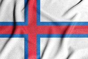 National flag of the Faroe Islands. The main symbol of an independent country. Flag of Faroe Islands. An attribute of the large size of a democratic state. photo