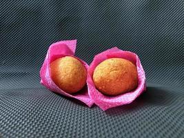 Indonesian Traditional Fritters  Combro, made from deep fried cassava and filled with spice inside photo