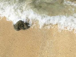 abstract sand of beach and soft wave background photo