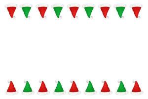 red and green hat santa claus christmas hat isolated on a white background photo