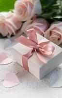 Pink pastel roses with gift box photo