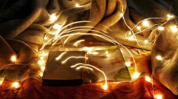 Headphones Surrounded By Fairy Lights In Long Exposure photo