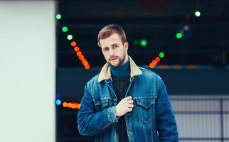 Man in denim clothes posing photo