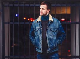 stylish man in a denim jacket photo