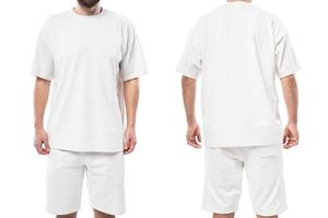 Man wearing blank white t-shirt and shorts on white background photo