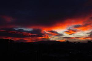 Beautiful sunrise red yellow clouds photo