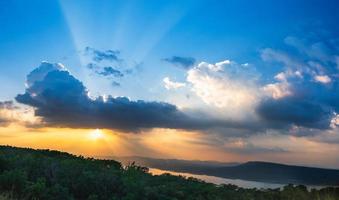 Sunset sky with ray light in twilight time photo