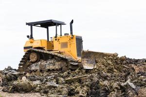 Bulldozer in construction site photo