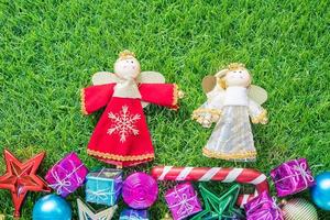 Christmas decoration on green grass with copy space photo