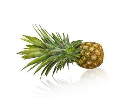 Fresh pineapple on white photo