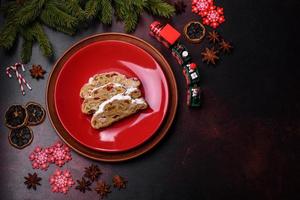 Tasty christmas stollen with marzipans, dried fruits and nuts photo