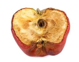 Half of the rotten apple is isolated on a white background. Full clipping path. photo