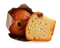 Whole and half muffin isolated on white background. Full clipping path. photo