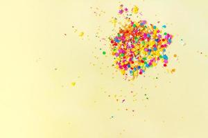 Bright confetti fireworks. Explosion of sweets. Festive card. Copy space photo