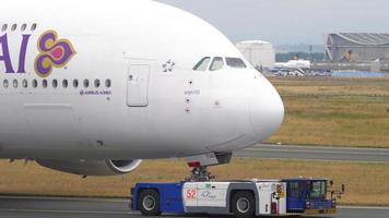 FRANKFURT AM MAIN, GERMANY JULY 20, 2017 - Thai Airways Airbus 380 HS TUD towing from service. Fraport, Frankfurt, Germany video