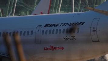 PHUKET, THAILAND NOVEMBER 13, 2019 - Thai Lion Air Boeing 737, HS LTR taxiing after landing at Phuket International airport video