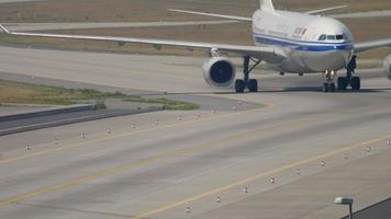 FRANKFURT AM MAIN, GERMANY JULY 19, 2017 - Air China Airbus A330 taxiing after landing at 07L. Fraport, Frankfurt, Germany video