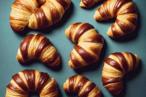 croissants with icing in modern bakery photo