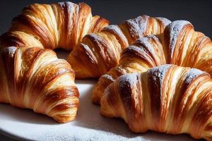 croissants with icing in modern bakery photo