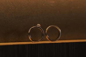 Beautiful couple gold wedding ring detail presentation. photo