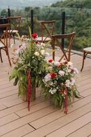 Beautiful bouquets and flower combinations for aisle decoration and special events like wedding ceremony and reception. photo