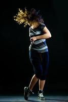 young woman dancing photo