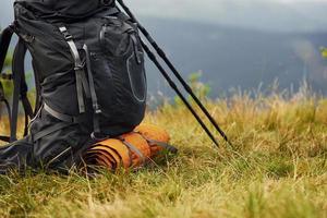 Touristick backpack. Majestic Carpathian Mountains. Beautiful landscape of untouched nature photo