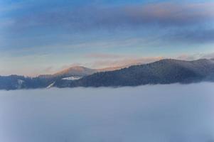 Winter landscape in mountains photo