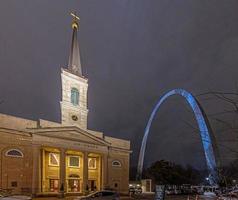 View on St. Louis Basilica and Gateway Arch at night photo